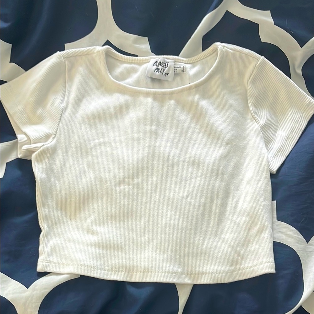 Princess Polly white ribbed tee shirt.